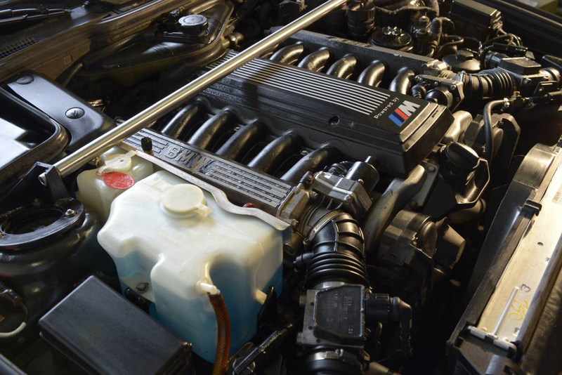 Illustration for article titled I'll Tell You What You Need: You Need This Manual V12-Swapped BMW E34 M5